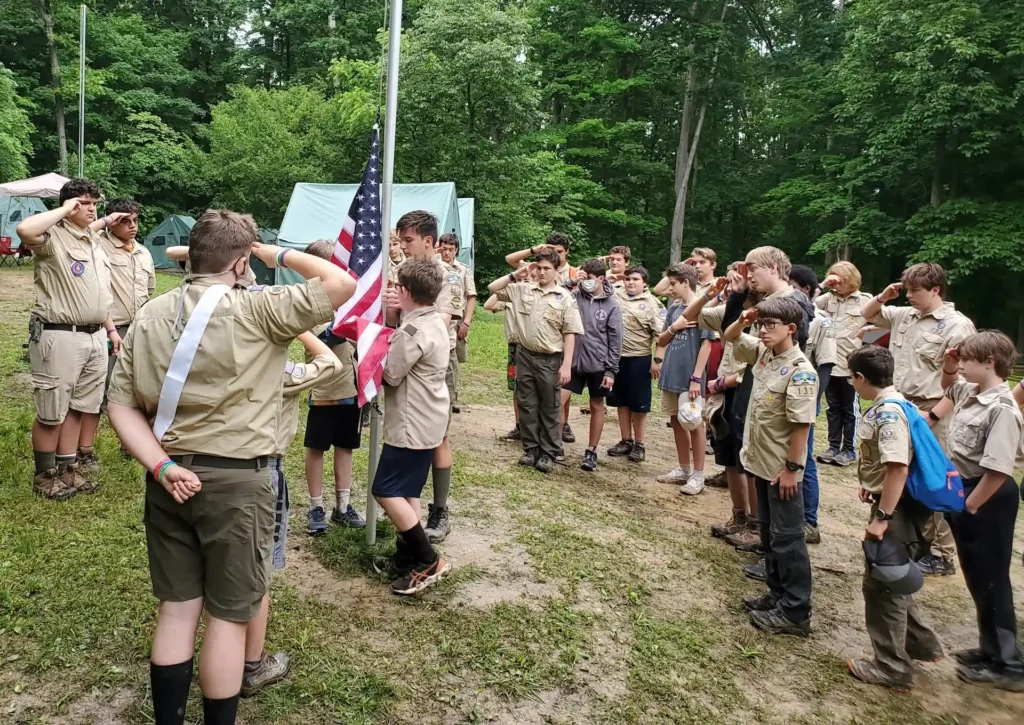 Scouts saluting flag